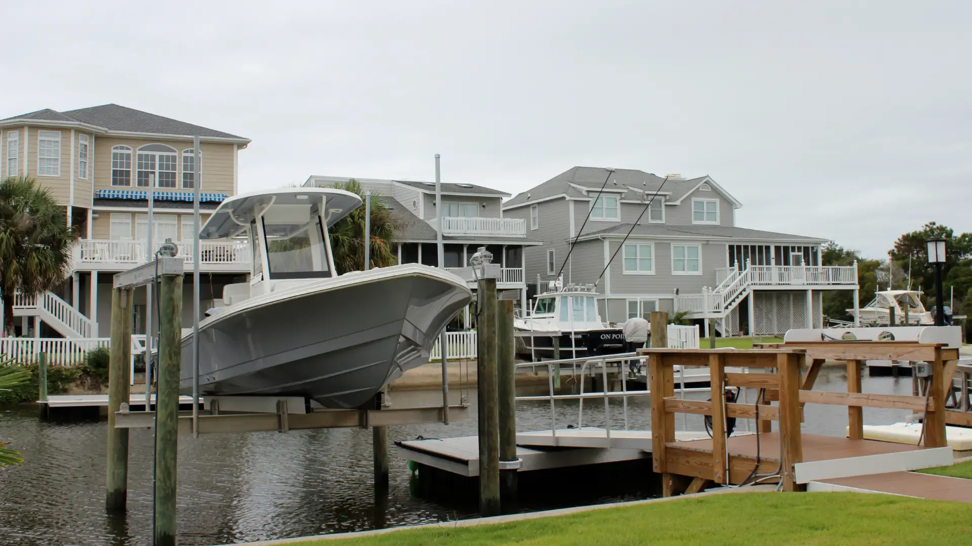 Boat lift and floating dock built along a coastal Carolina waterway