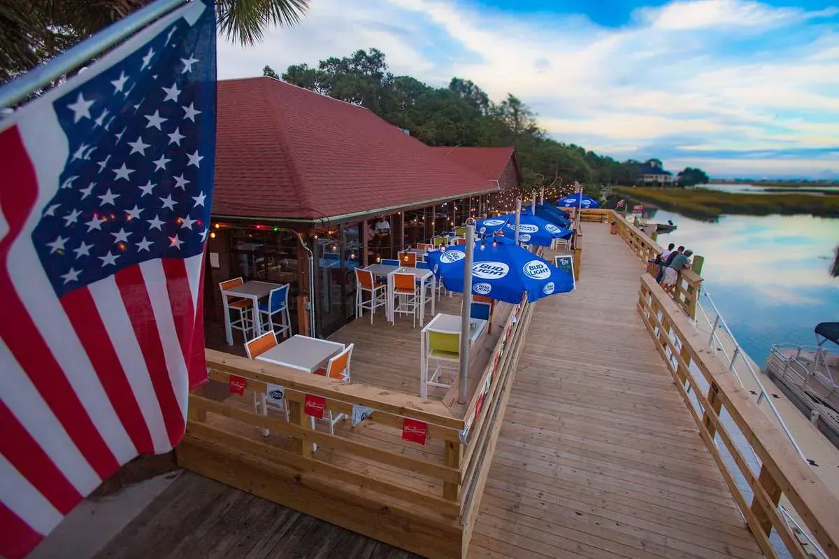 Waterfront deck and outdoor dining area at Bovine’s Restaurant in Murrells Inlet