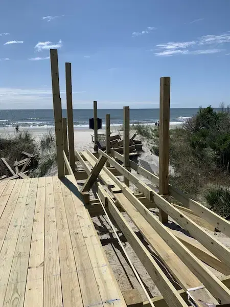 Ocean-facing deck and walkway framing under construction at Charlestowne Grant in Litchfield Beach