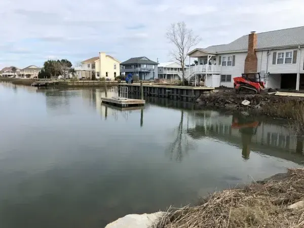 View across the Cherry Grove channel toward the seawall construction site