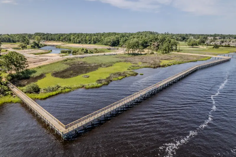 Aerial view of the long Hope Pointe pier and its shore connections along the Intracoastal Waterway