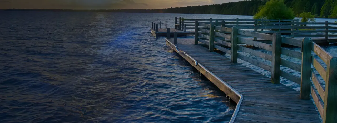 Timber fixed pier walkway supported over open water