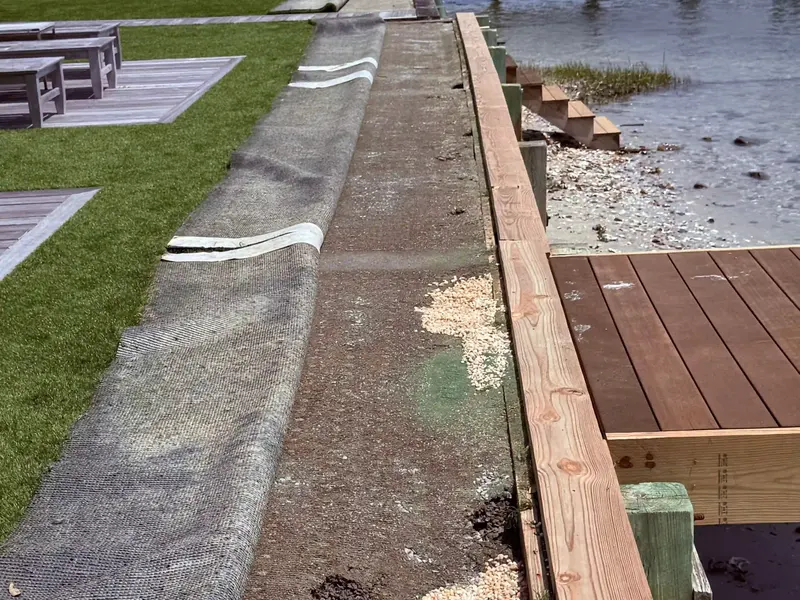 Specialty foam repair filling a void behind a seawall in Wrightsville Beach