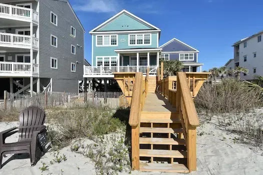 View from the beach toward the timber walkway and Surfside Beach house